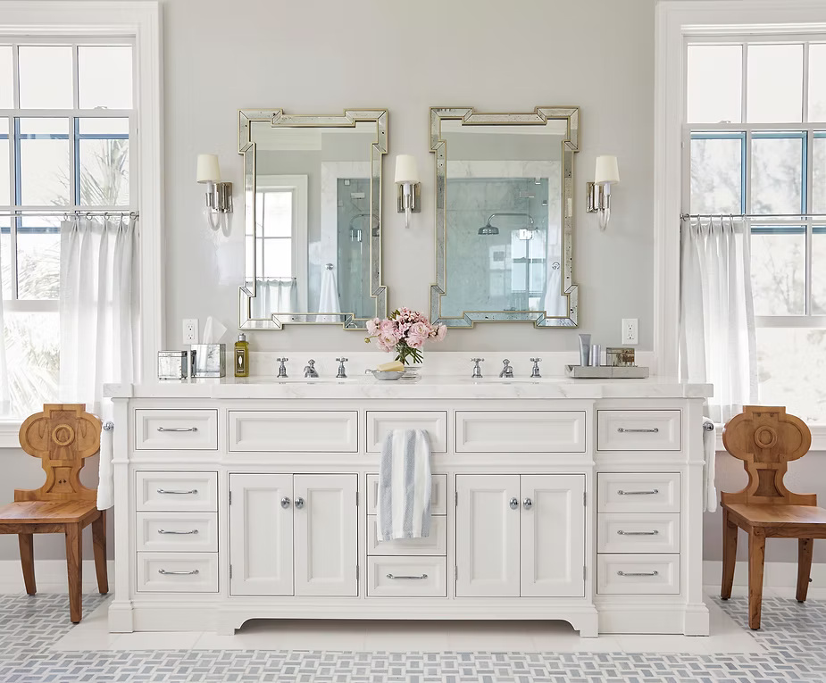 White double-sink bathroom vanity with mirrors.