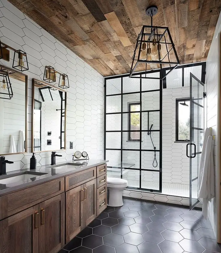 Rustic-style bathroom featuring a glass shower, wooden ceiling, and industrial lighting.