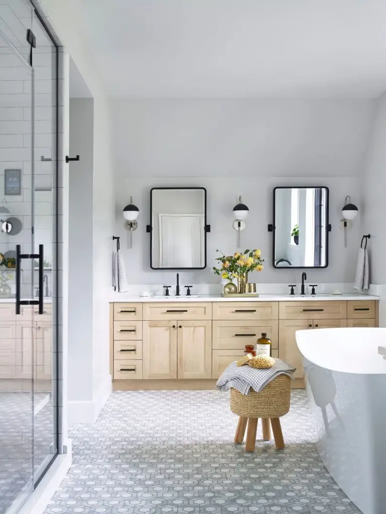 Contemporary bathroom with double mirrors and glass shower