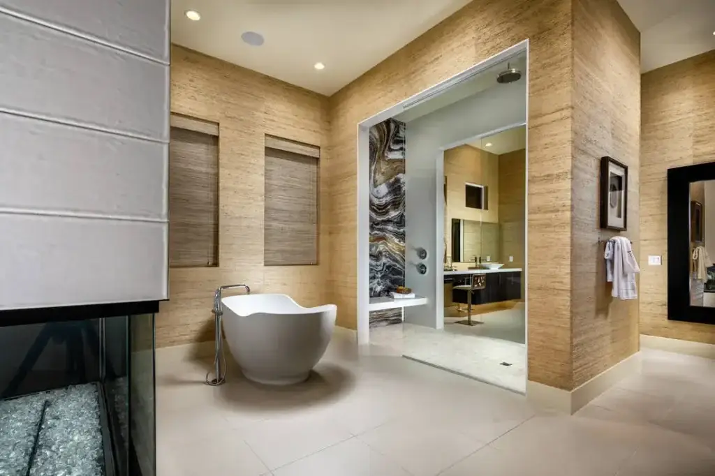 Beige luxury bathroom with soaking tub and open shower