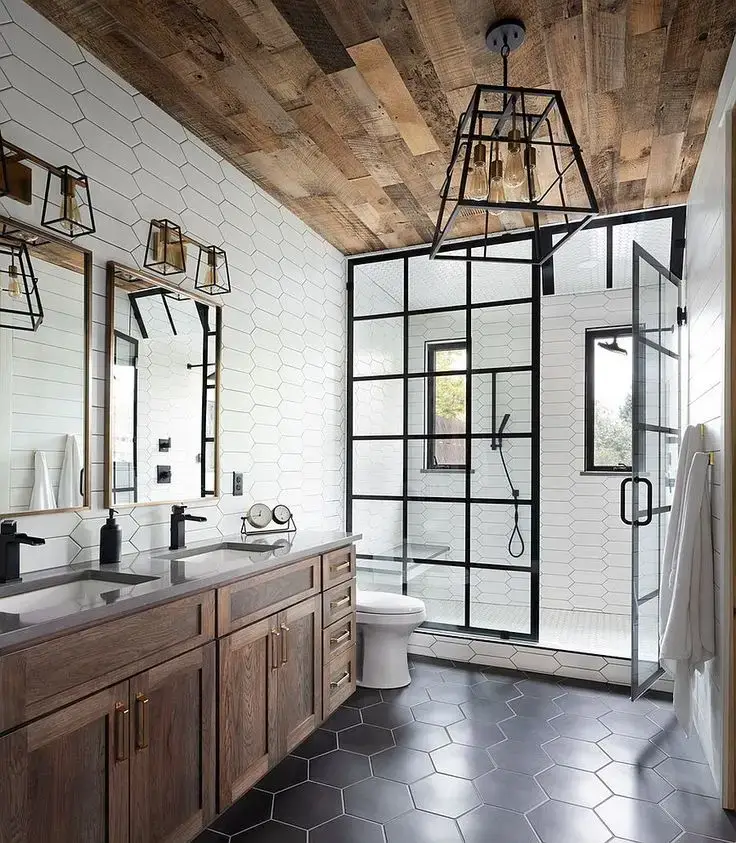 Modern bathroom with black-framed glass shower enclosure