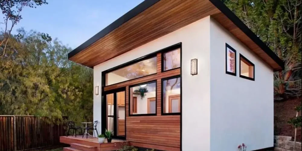 Contemporary compact home with clean lines, white walls, and wood trim.